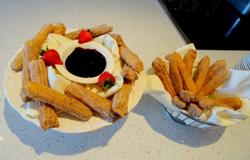 Absolutely the most delicious Brazillian churros with strawberries and chocolate dip