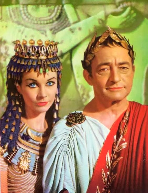 Claude Raines as Julius Caesar. Vivien Leigh as Cleopatra. Google image from https://www.pinterest.ca/pin/353884483198695403/l