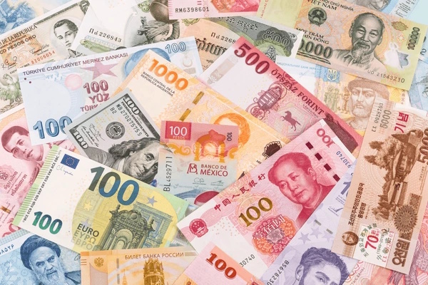 Foreign Money Bills image source: Shutterstock