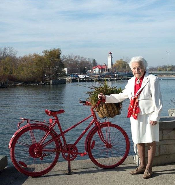 Hazel McCallion beside Red Bike at Port Credit Harbour Marina