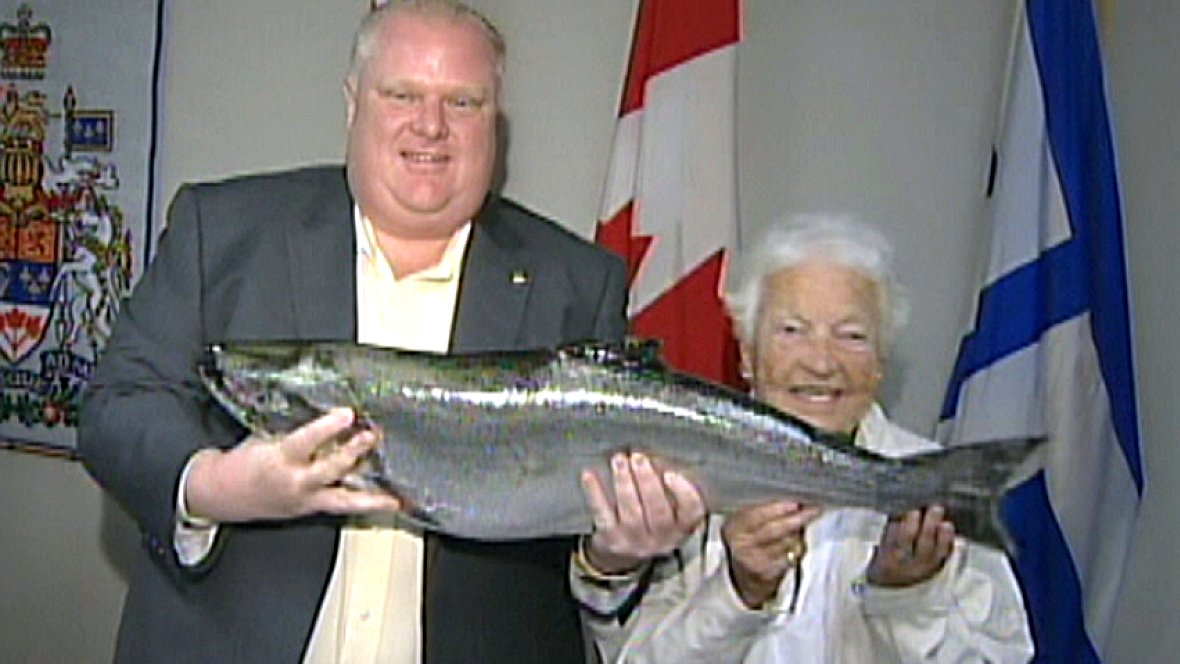 Mayor Rob Ford given 18lb Salmon caught by Mayor Hazel McCallion, Aug 2011 Google image from https://i.cbc.ca/1.1947216.1381383104!/httpImage/image.jpg_gen/derivatives/16x9_1180/hi-852-ford-fish.jpg