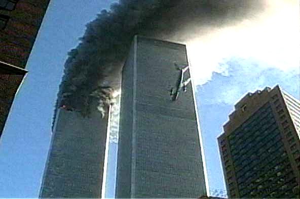 South Tower World Trade Center New York City September 11, 2001 at 9:03 am https://www.ibtimes.sg/worlds-biggest-conspiracy-theory-was-9-11-world-trade-center-attack-inside-job-23534