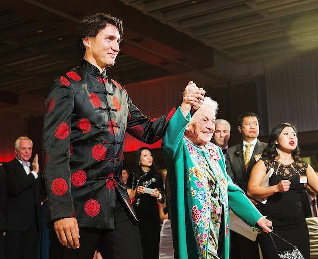 Justin Trudeau with Hazel McCallion on his arm Google image from http://www.macleans.ca/wp-content/uploads/2016/02/TRUDEAU-story.jpg