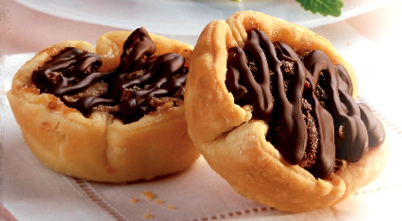 Chocolate Pecan Tarts Google image from https://www.dairygoodness.ca/recipes/chocolate-pecan-tarts