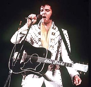 Elvis Presley with guitar Google image from http://i.telegraph.co.uk/multimedia/archive/01486/elvis_1486800c.jpg