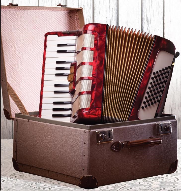 Accordion in a Case image from Robert Speck Heritage Celebration March 30, 2014 Advertisement